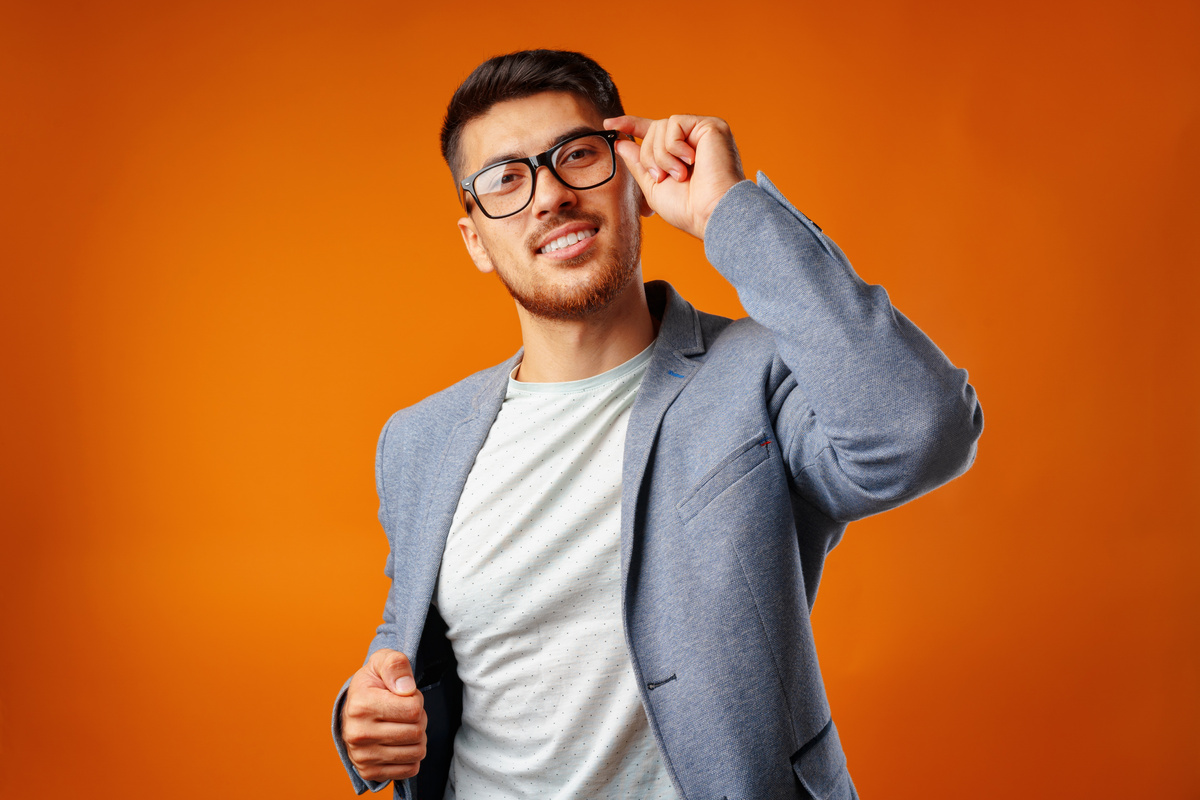 Portrait of a young smart man businessman wearing glasses